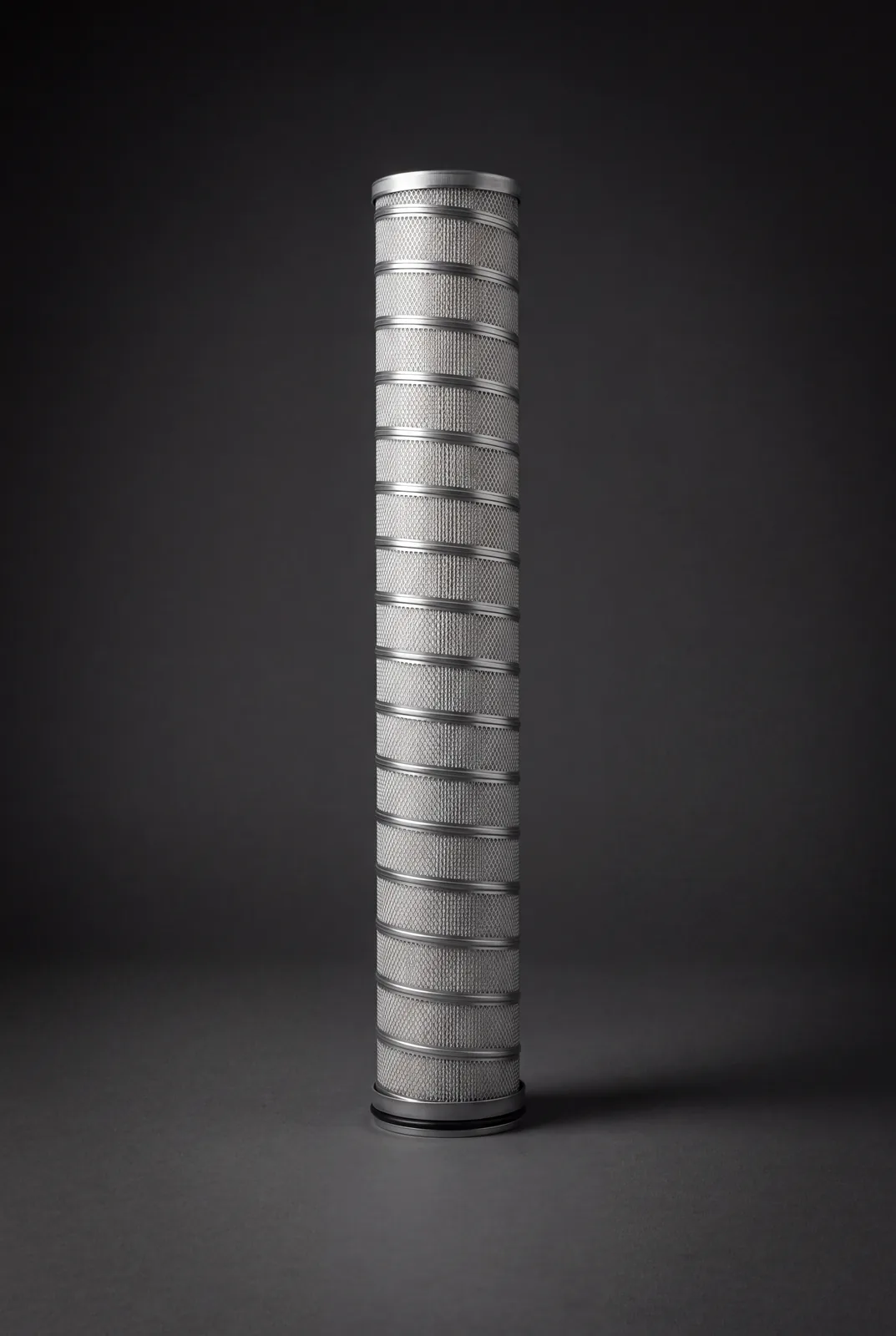 PECO Facet XstreamPure compatible high-flow pleated stainless-steel mesh replacement filter cartridge, standing view showing full element length – R+F FilterElements